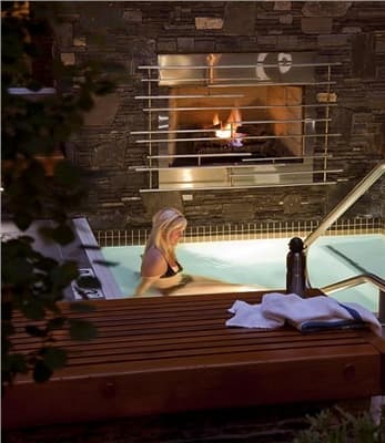 Banff Aspen Lodge - two outdoor hot tubs with fireplace