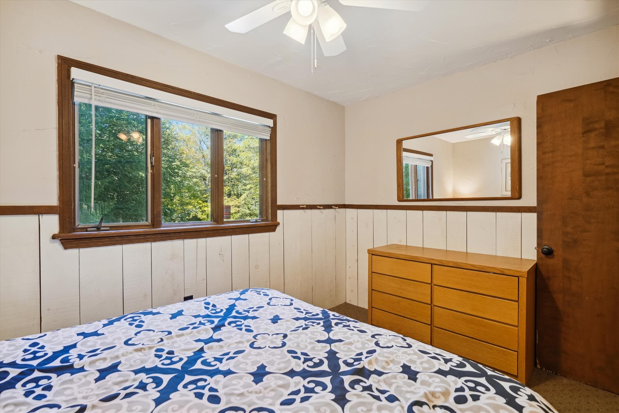 Master bedroom on upper level with queen bed
