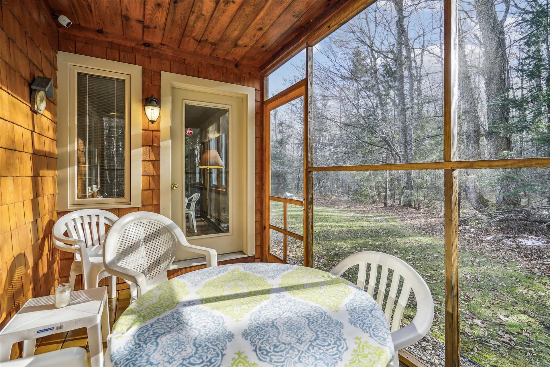 This deck is screened in for your comfort.