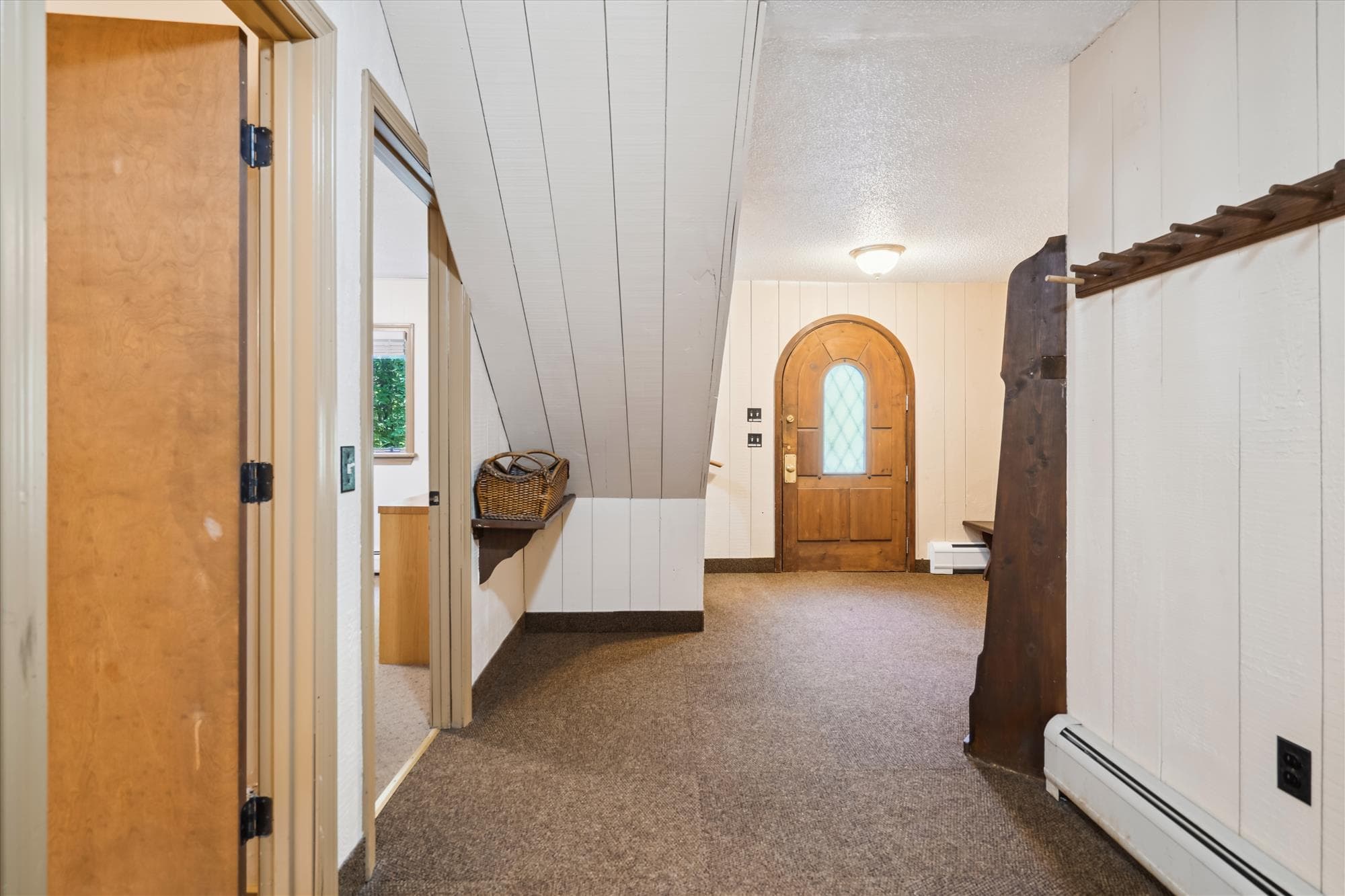 The hallway to the front door.