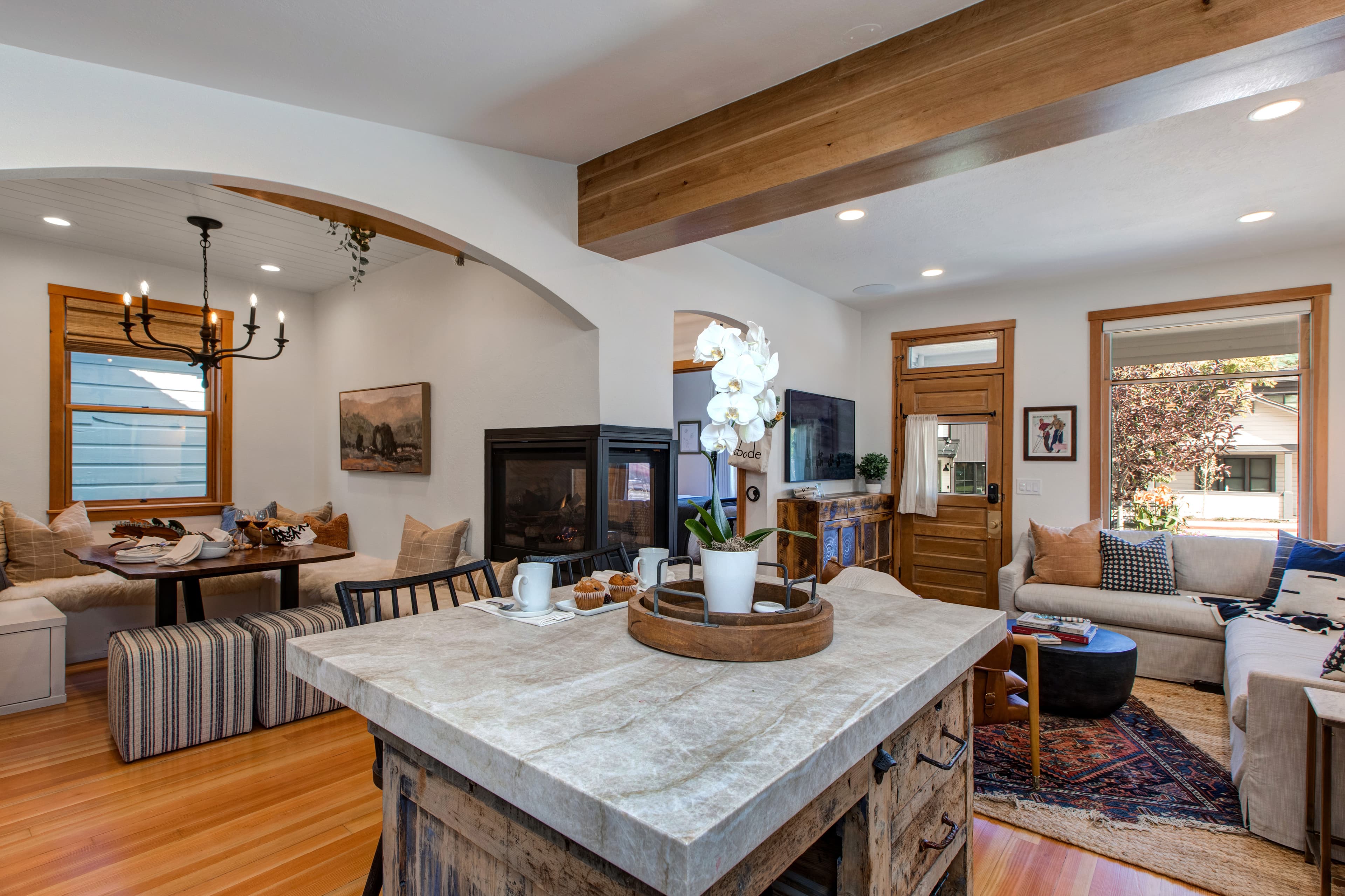 Open concept kitchen, dining area and living room.