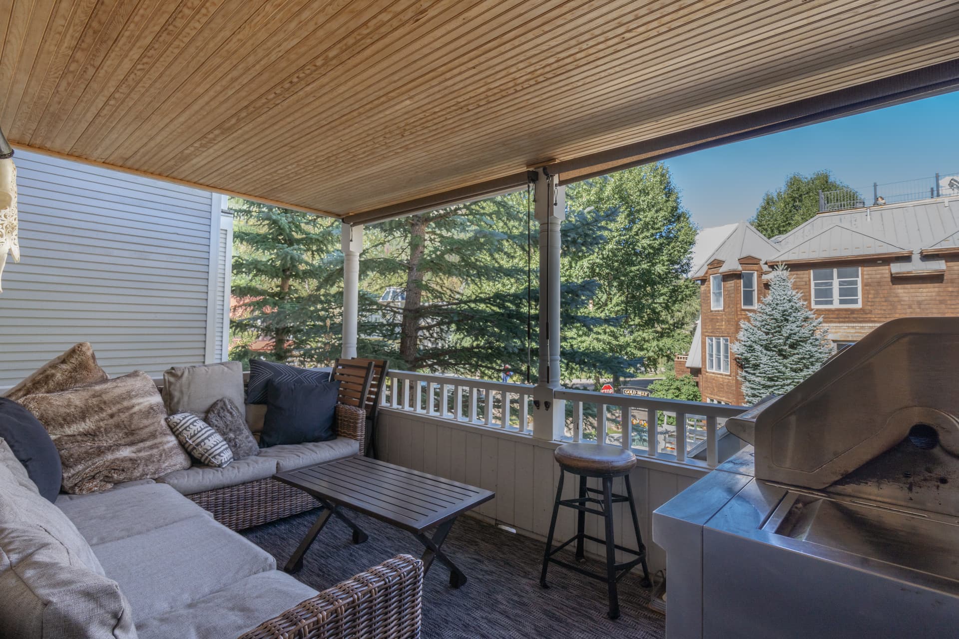 Enjoy a glass of wine or morning cup of coffee on the covered balcony.