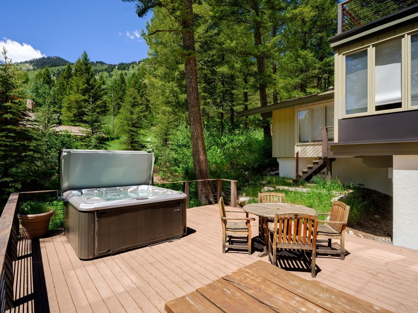 Lower Deck with Hot Tub and Dining Table