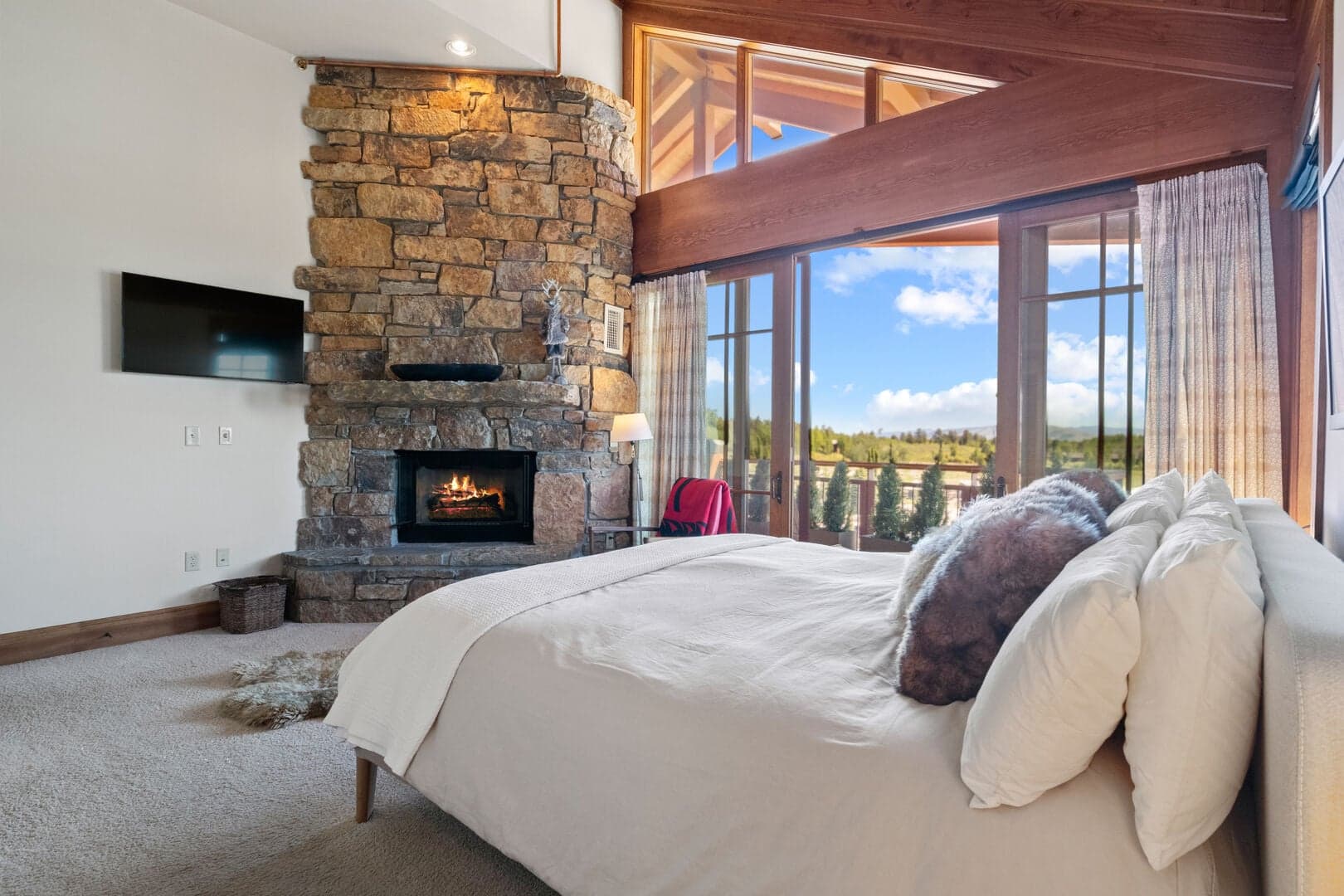 Master Bedroom w/ Gas-Burning Fireplace and Deck