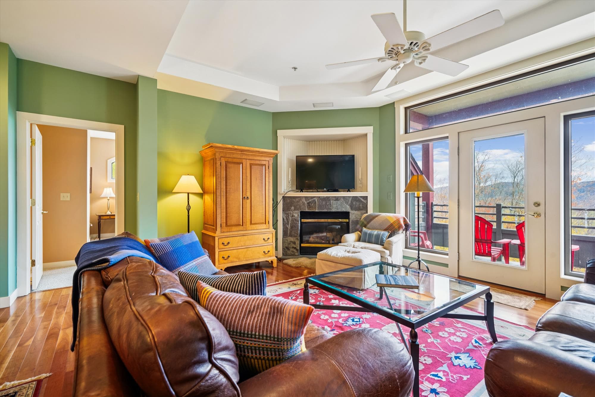 Settle in by the fireplace or open the doors to fresh mountain air. This inviting space brings everyone together for movies, board games, or a quiet evening watching the sunset.