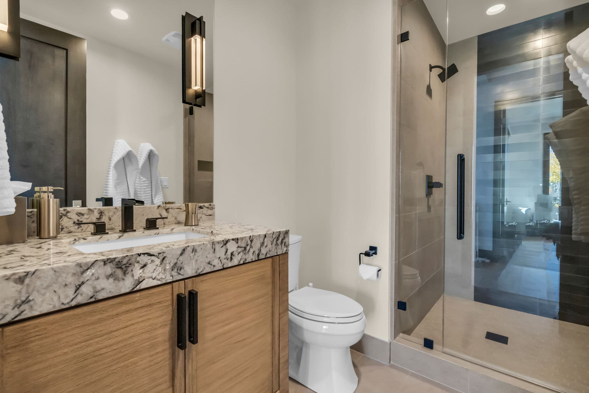 Walk-in Shower with Glass Door and Single Sink Bath Vanity
