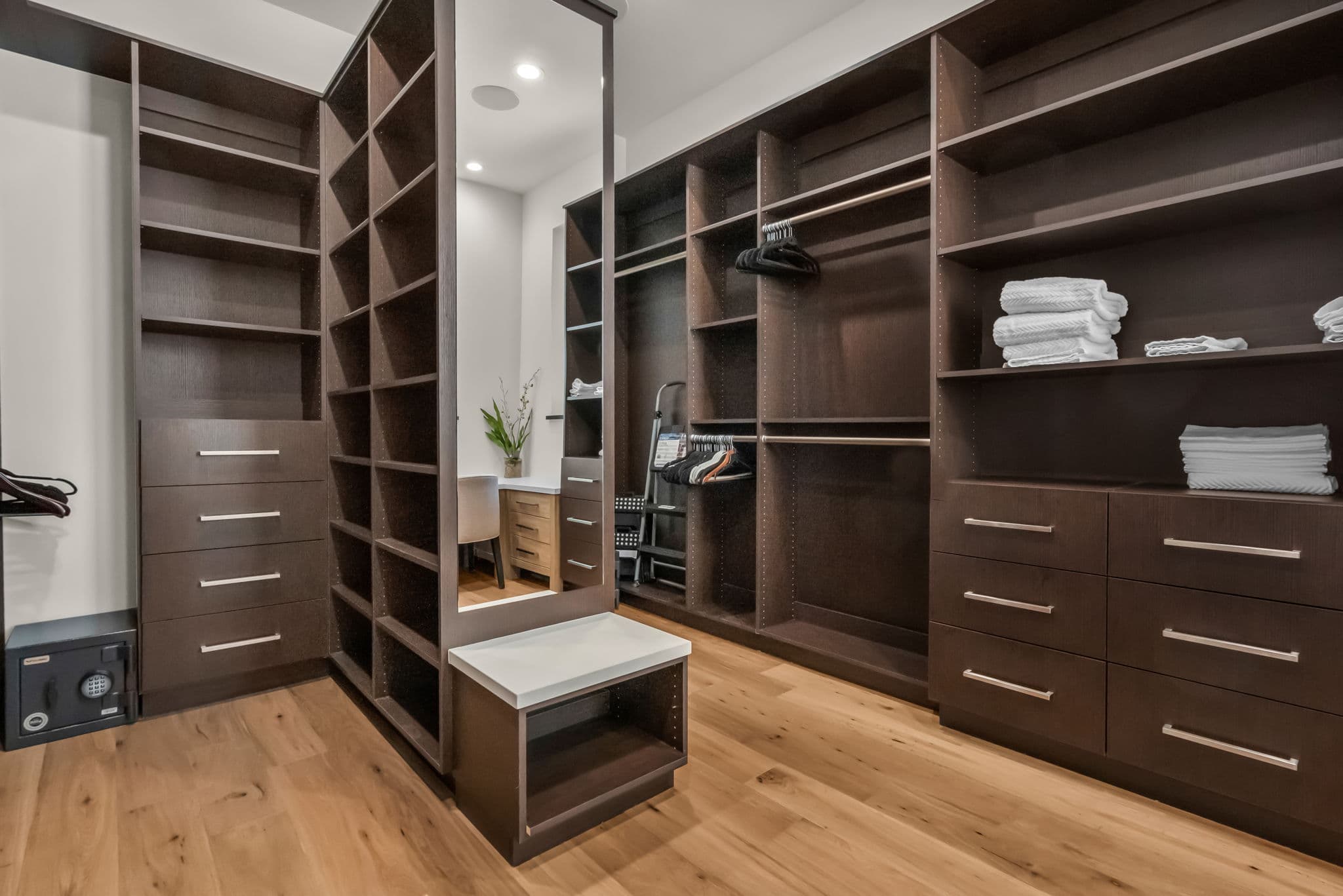 Walk-in Closet with Wall-Mounted Cabinets, Shelf, and Drawers