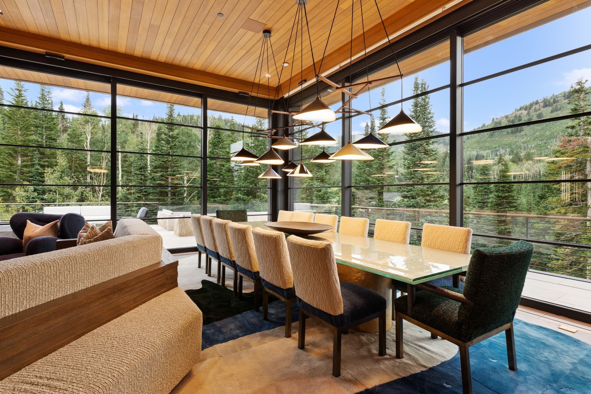 Enjoy a Family Meal with a Custom Gold Leaf Dining Table with Room for 14 in One of Our Luxury Park City Vacation Rentals.