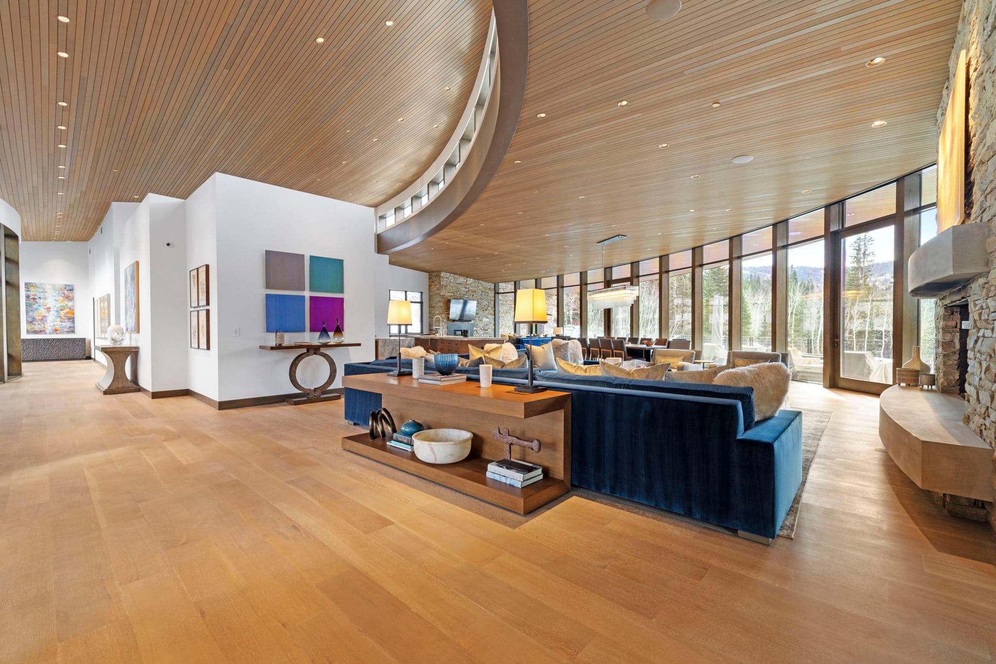 A spacious living area with sofas and modern decor.