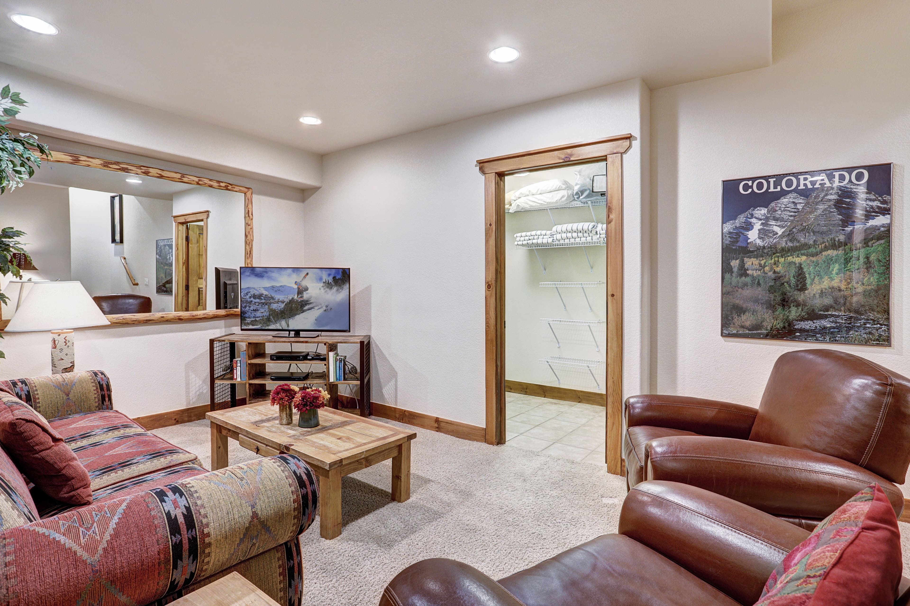 Lower level living area with a pullout couch for extra sleeping arrangements - Amber Sky Breckenridge Vacation Rental