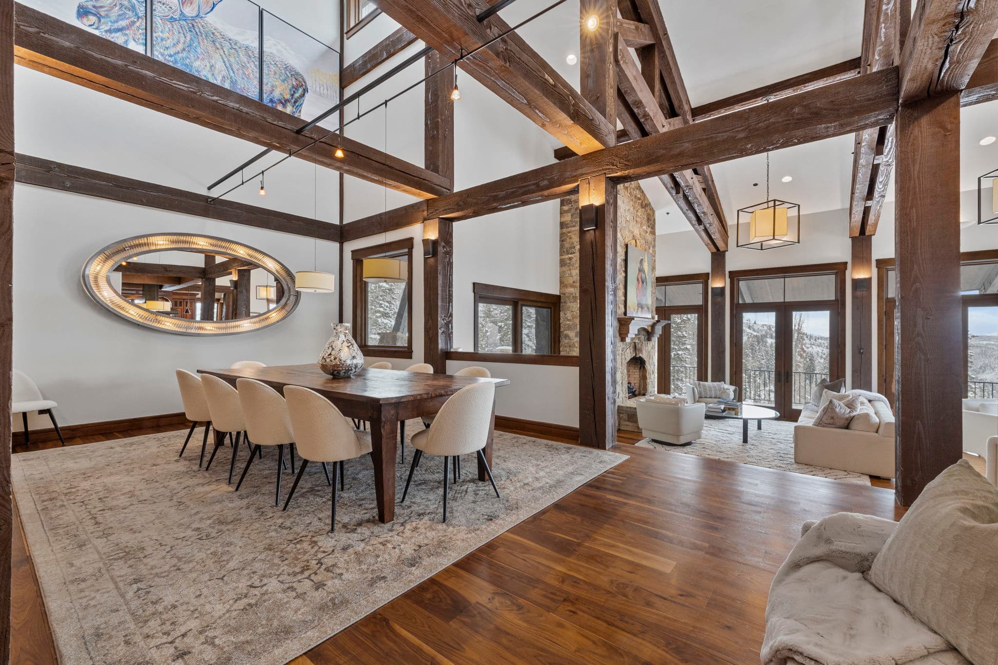 a view looking into the dining room with the living room in the background