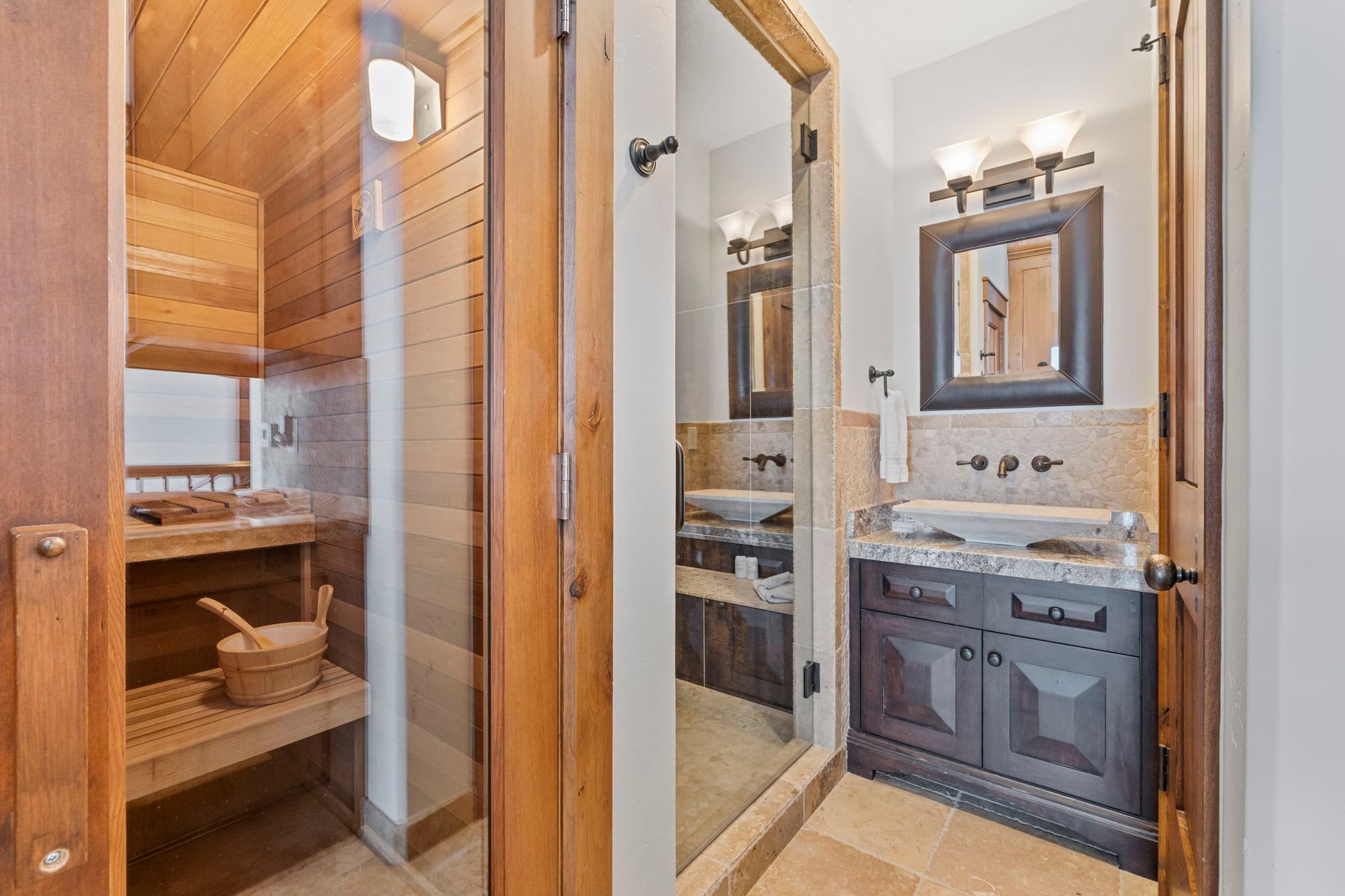 ski room with full bath and sauna