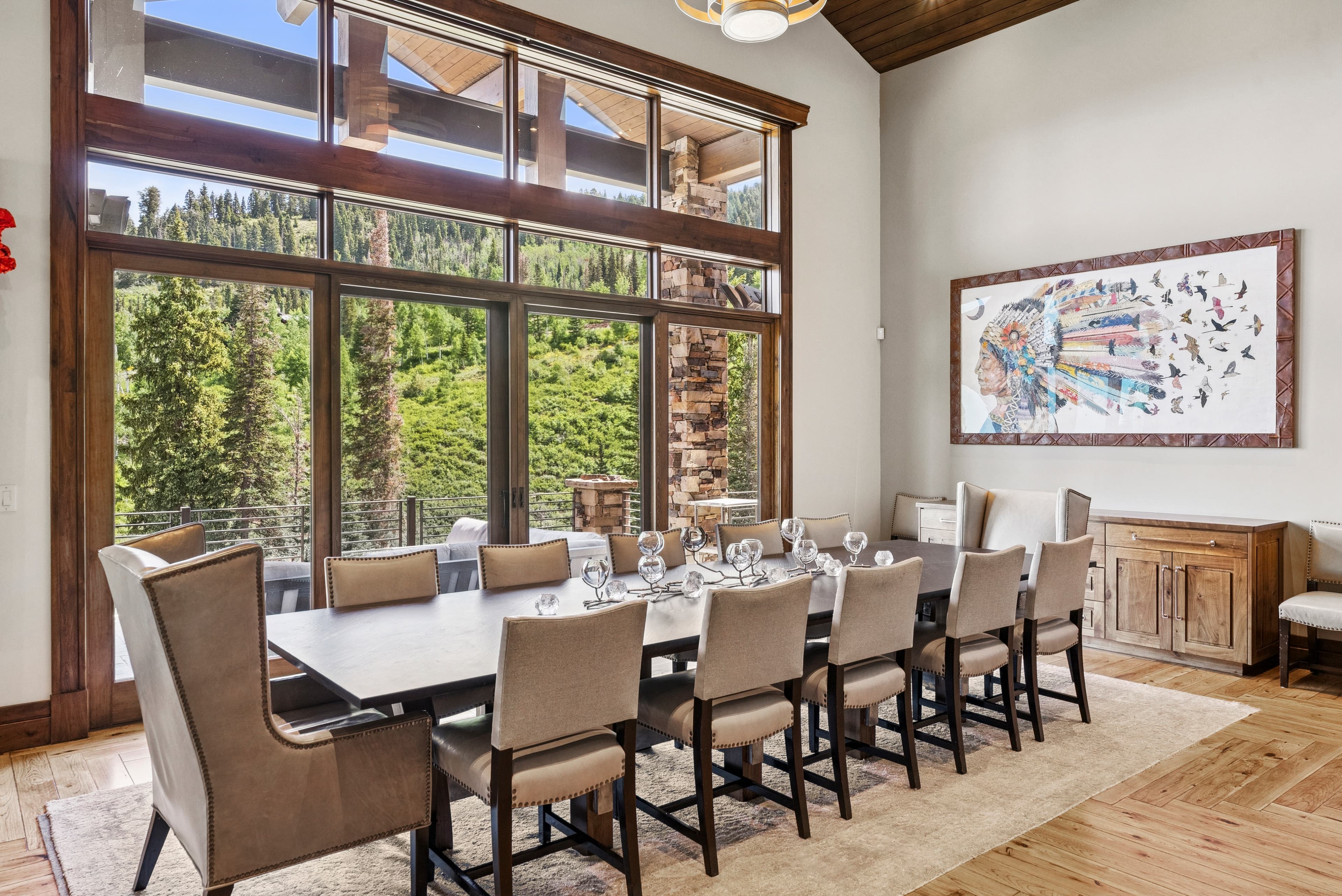 large dining room table with forest and mountain views
