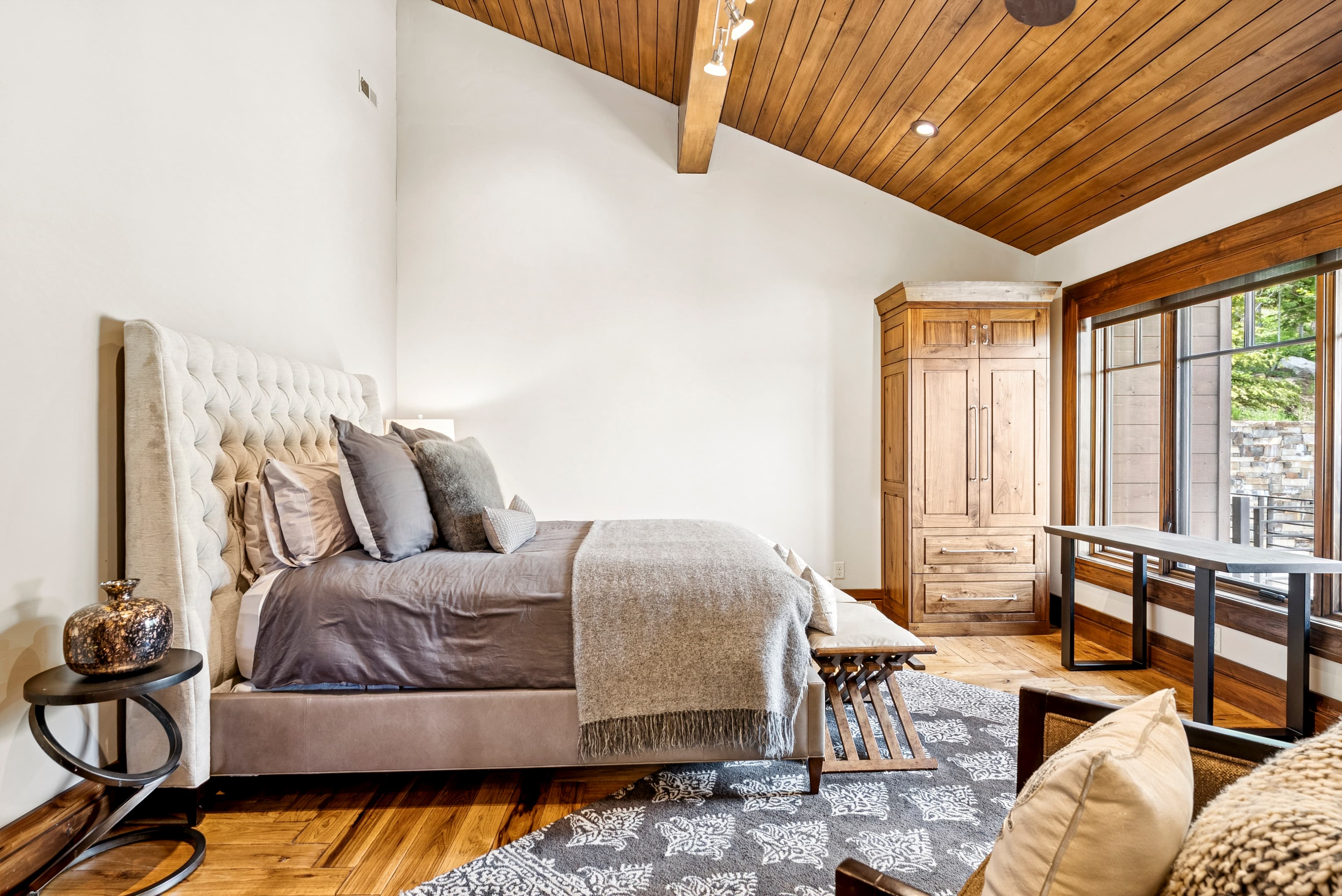 guest suite at grand view with large window and mountain views