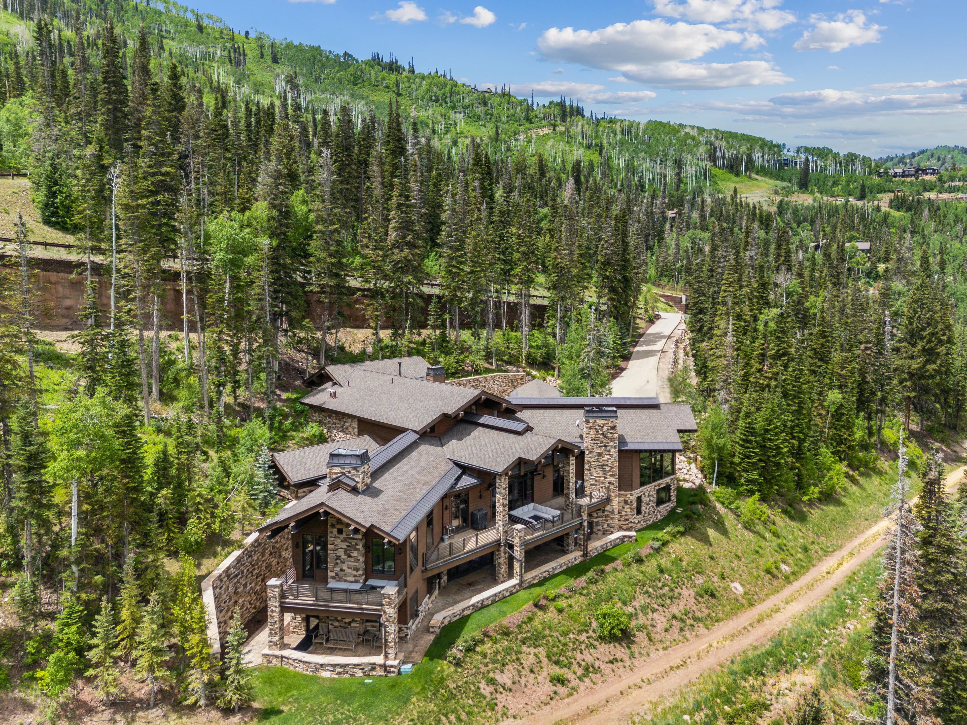aerial view of grandview and the mountain terrain and ski runs around it